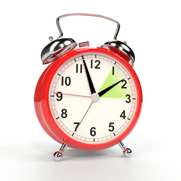 istock Daylight saving time concept. Alarm clock isolated on white background. 1136560051