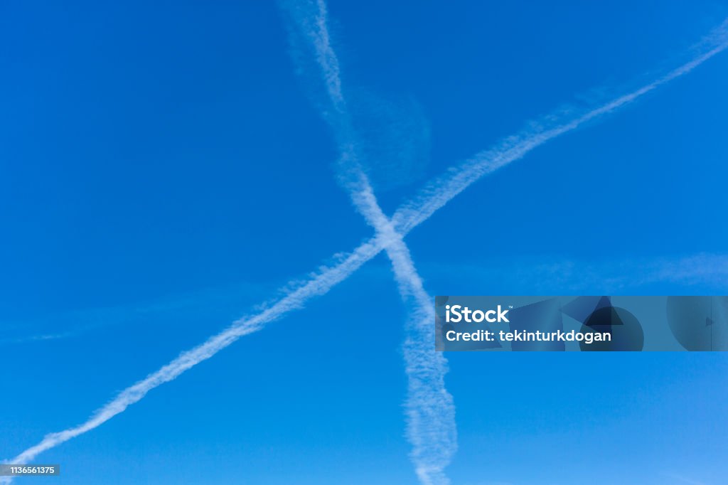 plane exhaust marks at sky by Salt lake City SLC Utah USA Airplane Stock Photo