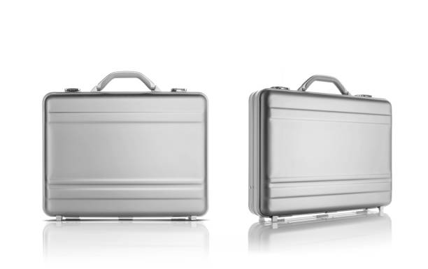 istock two Light grey metal suitcases isolated on white background 1136564017