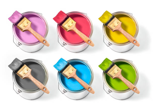 istock Cans with different decorator's paints with brush on top on a white background 1136564033