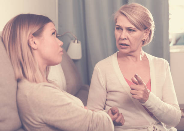 istock mother scolds her adult daughter 1136565529