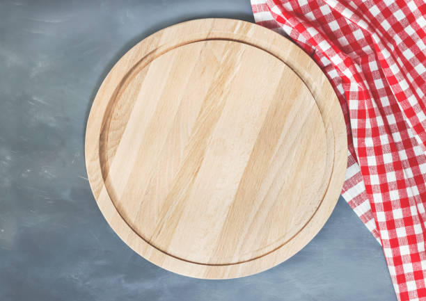istock Cutting board or chopping board on wooden table. 1136567047