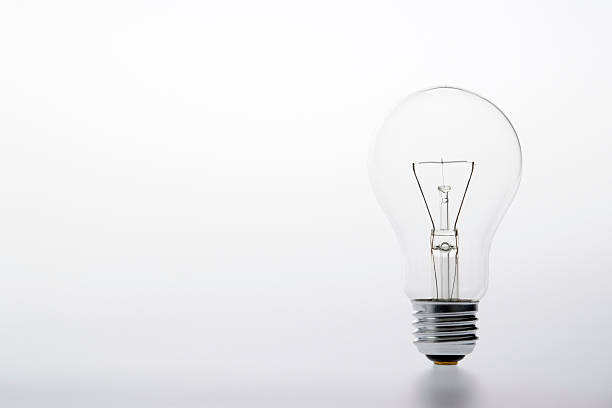 istock Isolated shot of light bulb on white bright background 113657002