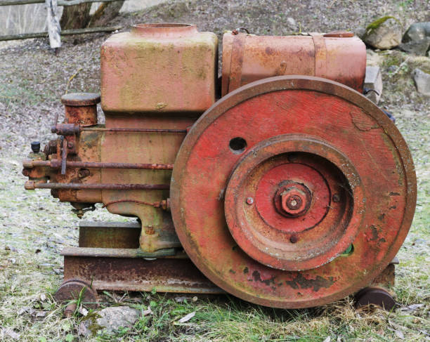 istock Rusty  vintage  small  tractors  diesel engine  in forgotten village 1136570569