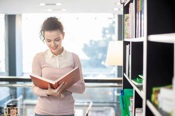 istock Female student in a bookstore 1136571344