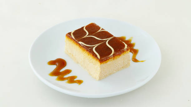 istock semolina dessert and tirilece dessert on plate white background 1136578779
