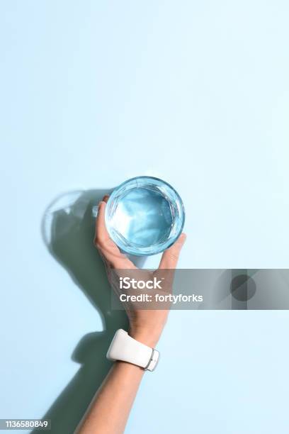 Healthy Body Hydration Level Keeping Concept Stock Photo - Download Image Now - Water, Drinking, Drinking Glass