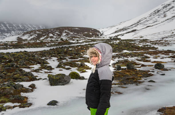 istock Girl looking at the camera on Iceland wilderness 1136580951