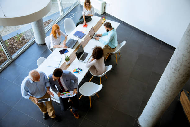 istock Top view at business people in the office 1136586010