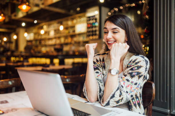 istock Young woman celebrating 1136586039