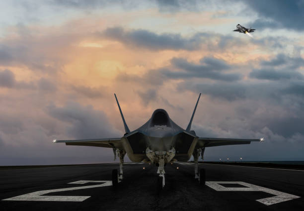 istock F-35 fighter jet ready to takeoff on runway at sunset 1136586623