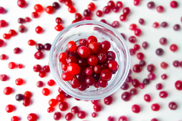 istock Flat lay raw red cranberries in a glass 1136586767