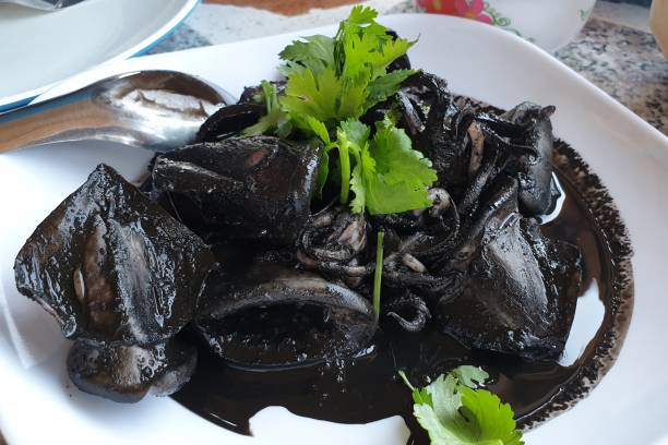 istock Seafood  squid with ink sauce, Thai food 1136587142