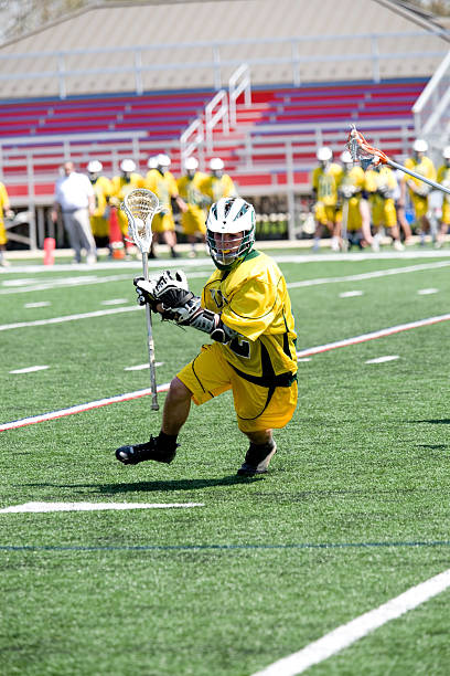 High School lacrosse player on the attack
