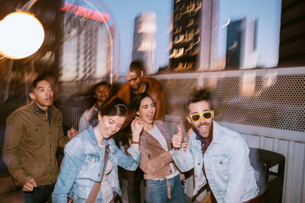 istock Friends Have Fun On Downtown Los Angeles Rooftop 1136592029