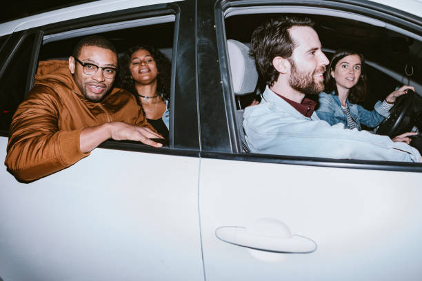 Friends Explore Downtown Los Angeles At Night In Shared Car