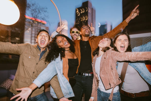 istock Friends Have Fun On Downtown Los Angeles Rooftop 1136592978