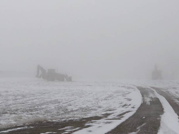 istock Foggy Morning Road & Equipment 1136593155