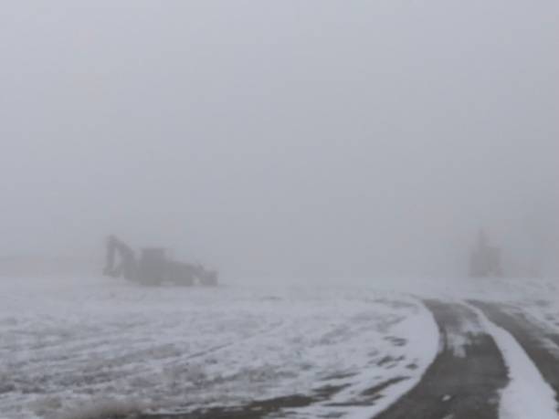 istock Foggy Morning Road & Equipment 1136593161
