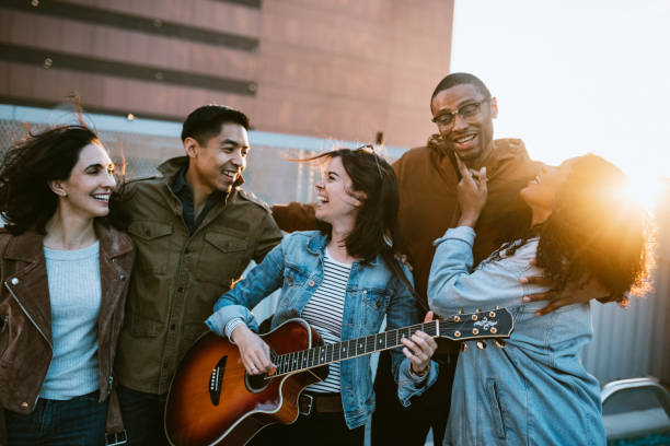 istock Friends Have Fun On Downtown Los Angeles Rooftop 1136593202