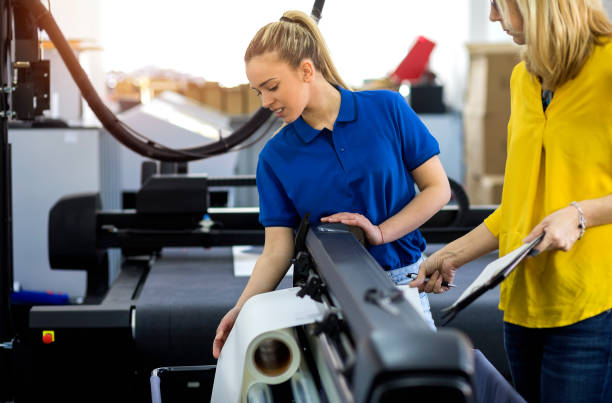 istock Female workers in printing factory 1136593418