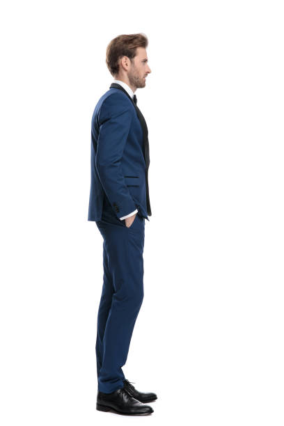 istock side view of serious man in blue costume looking away 1136593935