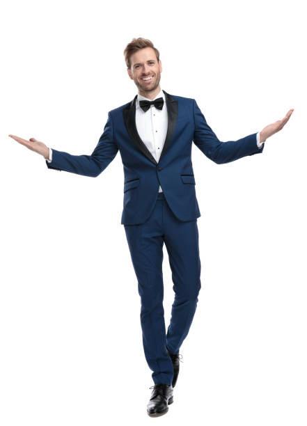 istock positive guy in blue suit greeting with hands 1136594567