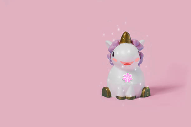 istock toy cute unicorn on a pink background in glitter 1136594682