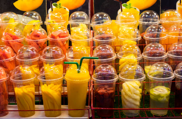 Fruit and fruit shakes in plastic cups