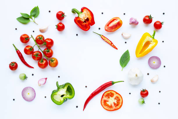istock Various fresh vegetables and herbs on white background. Healthy eating concept 1136597360