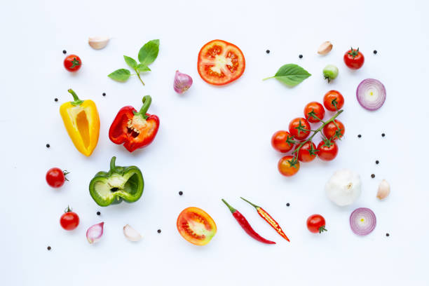 istock Various fresh vegetables and herbs on white background. Healthy eating concept 1136597405