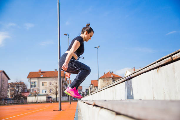 istock Sports woman jumping 1136598168