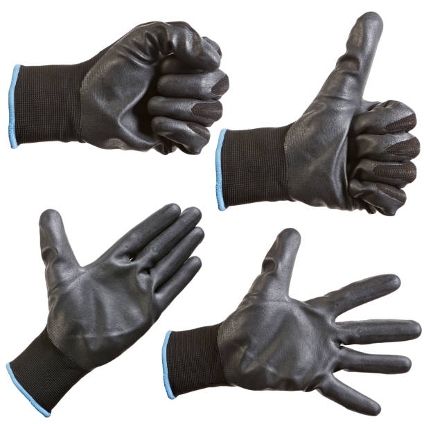 istock Protective gloves for hands during repair and construction works, isolated on white background. 1136602138