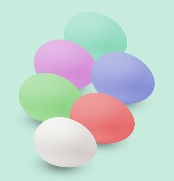 istock Multi-colored Easter eggs. Holiday in the house. light green background. 1136602929