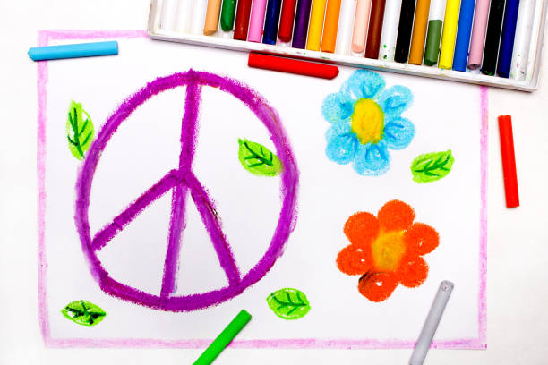 istock Colorful drawing: Peace sign and flowers 1136609146