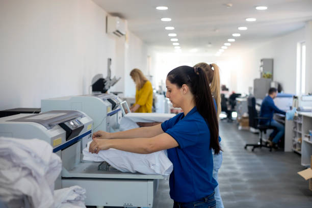 istock Female worker in a printing factory 1136609268