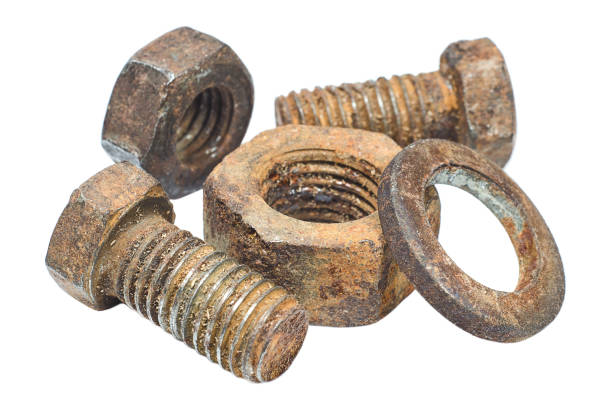 istock Rusty nuts and bolts isolated on white background closeup 1136611156