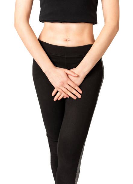 istock Woman holding her crotch 1136615255
