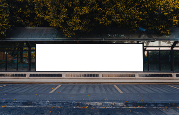 istock big blank billboard white LED screen horizontal outstanding in the park at city on pathway walking at side the road for display advertisement text template promotion new brand at outdoor ad. 1136621815