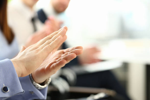 istock Group of people clap their arm in row during seminar 1136623448