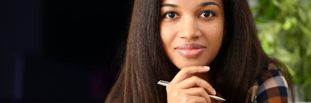 istock Beautiful black woman portrait look at camera 1136624950