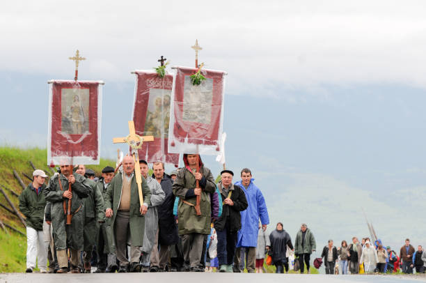 Sumuleu Ciuc, Romania - May 22, 2010: Hungarian Catholic pilgrims, crowd of people gathering in Csiksomlyo to celebrate the Pentecost. The religious event is a symbol of Szekler national identity.