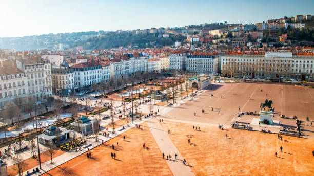 Unique aerial view of famous big Place Bellecour in the French city of Lyon in early spring season Unique and majestic aerial view of famous, big and ancient Place Bellecour in the French city of Lyon in early spring season. Large town square in the centre of Lyon, the largest open pedestrian square in Europe, with in the middle the equestrian statue of king Louis XIV on his horse. This photo was taken in Lyon city, Unesco World Heritage Site, in Rhone department in Auvergne-Rhone-Alpes region, in France (Europe) in february during a bright sunny day. lyon photos stock pictures, royalty-free photos & images