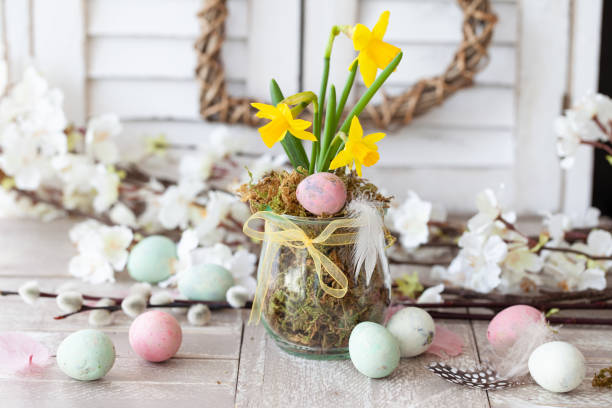Fresh daffodils and easter eggs stock photo