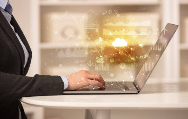 istock Business woman working on laptop with cloud technology concept 1136630030