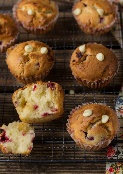 istock Sweet muffins with raspberries, cranberries and white chocolate chips 1136632350