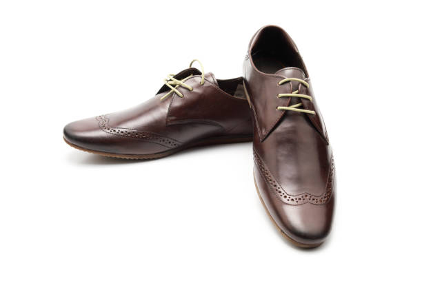 istock two stylish brown shoes 1136632693