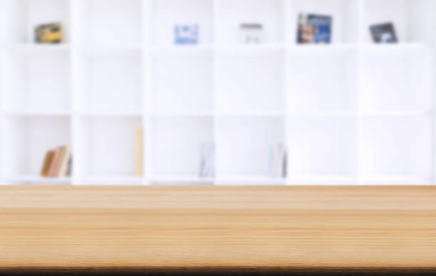istock Selected focus empty old wooden table and Library or Bookstore blur background with bokeh image. for your photomontage or product display 1136637463