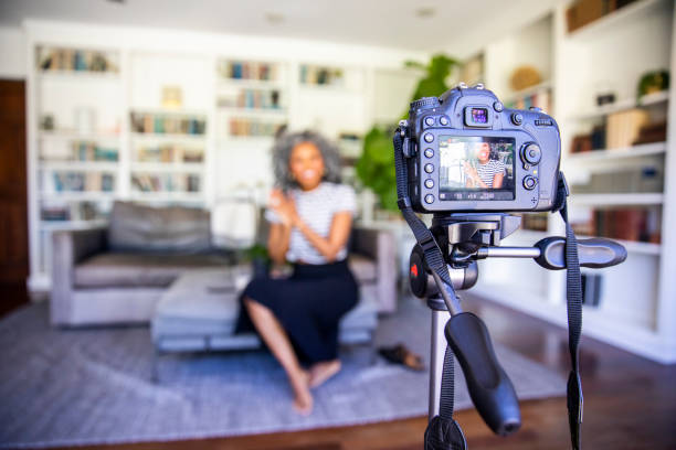 istock Beautiful Black Woman Recording a Video 1136638053