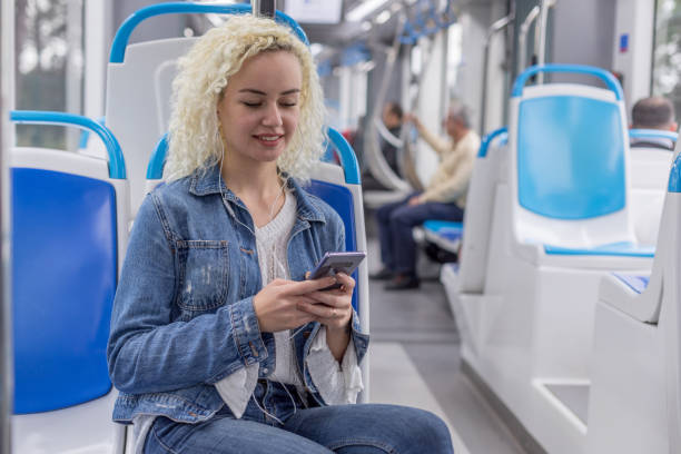istock Young woman riding at the modern train 1136638630